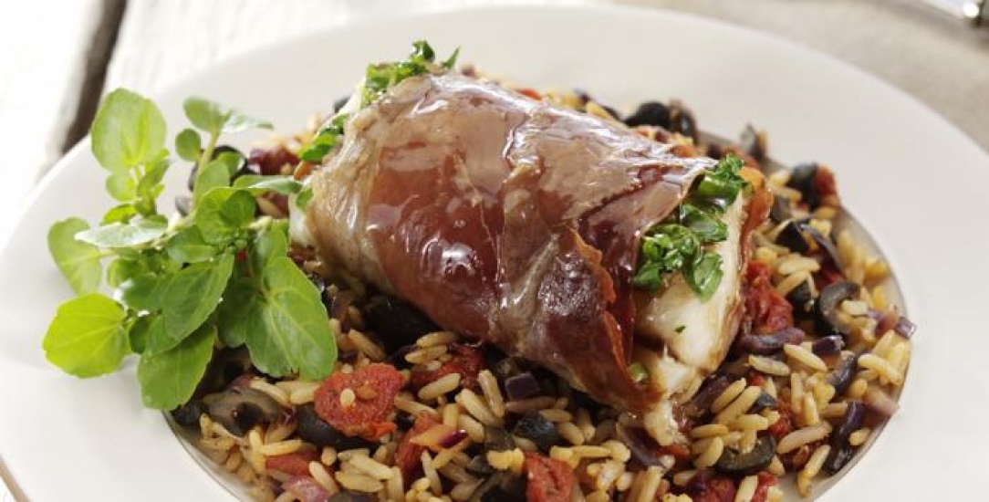 Cod wrapped in parma ham and rice