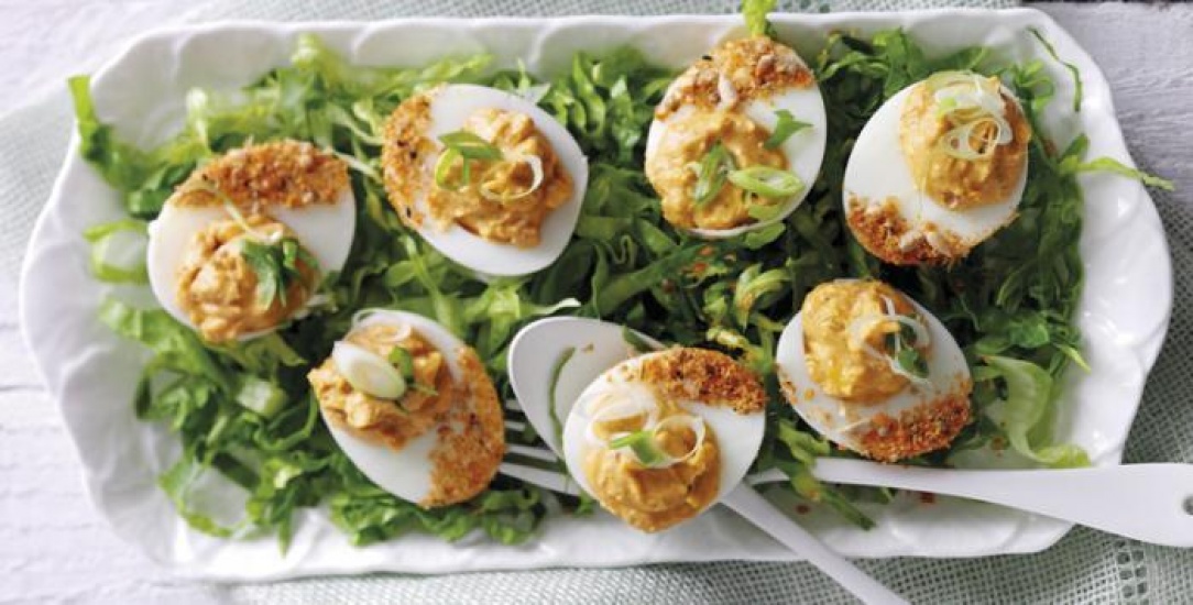 Curried eggs on a bed of lettuce