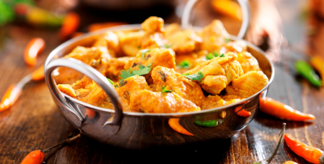 Curry in a metal bowl