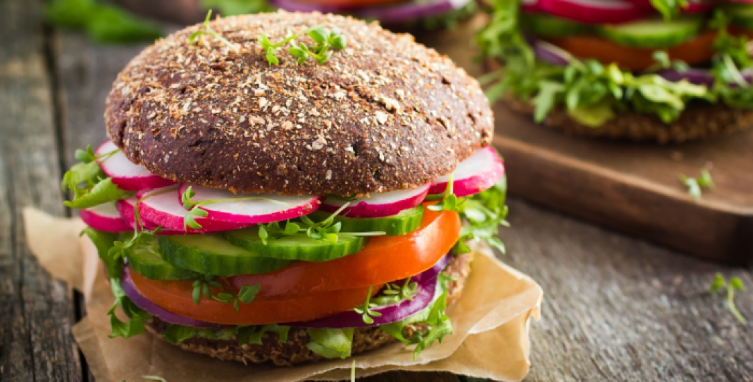 Sandwich with lettuce, cucumbers and tomatoes