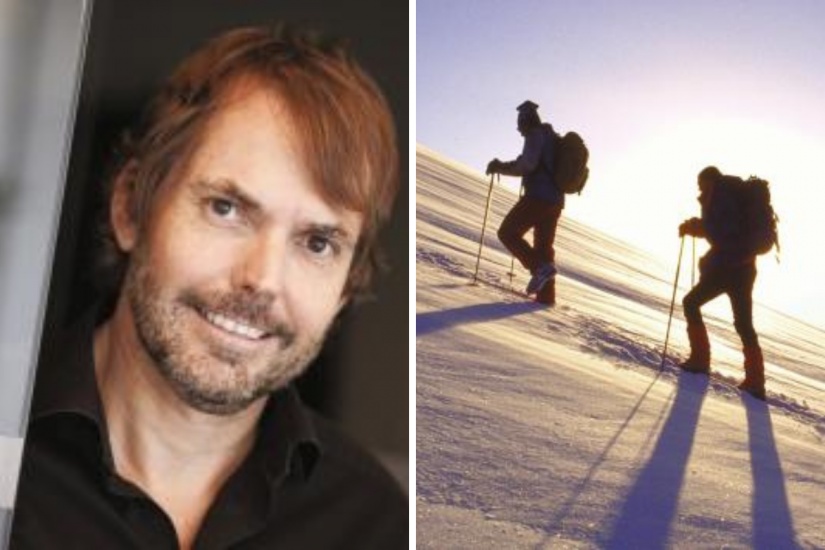 Jeremy Middleton and two people hiking up a mountain
