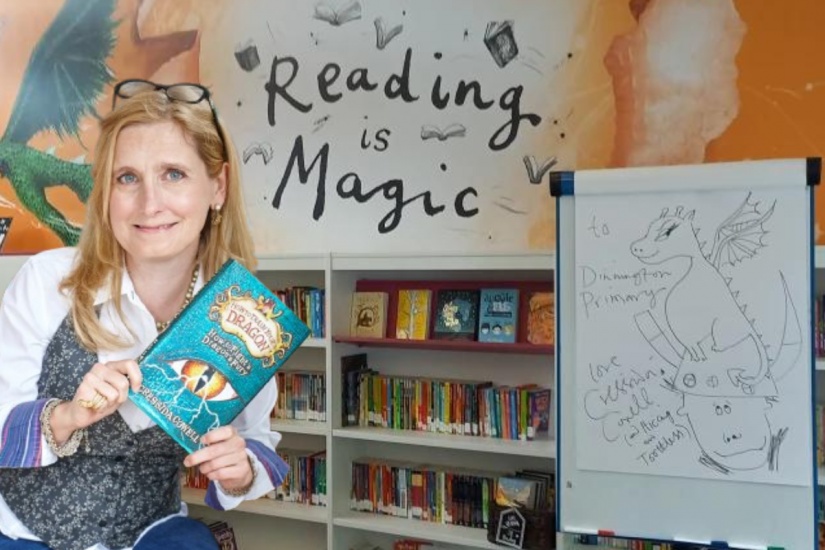 Children's author Cressida Cowell in front of library