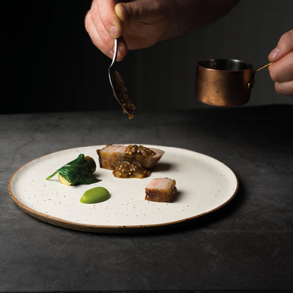 Food being served onto plate