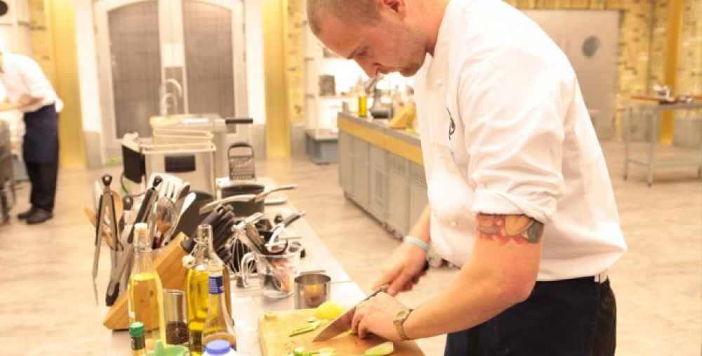 Chef chopping fruit