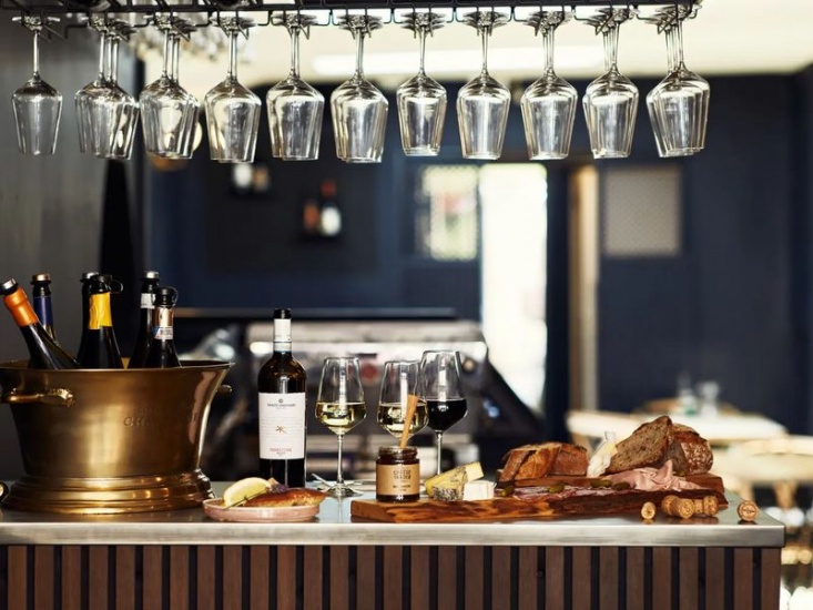 wine on a bar with selection of bread