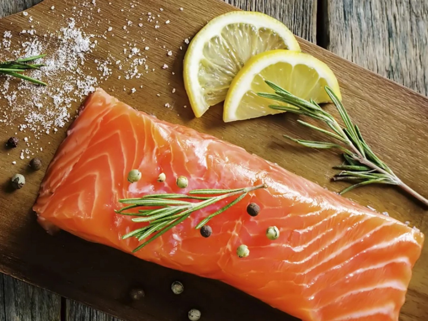 raw salmon on a wooden board