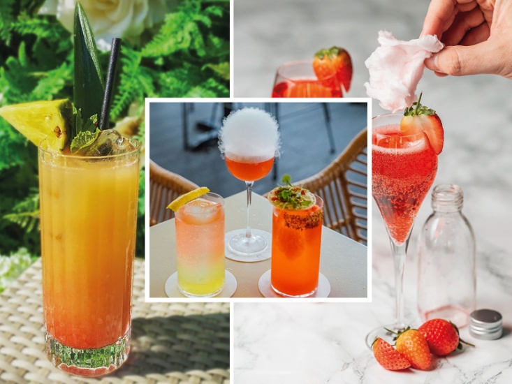 3 cocktails decorated with fruit and candy floss