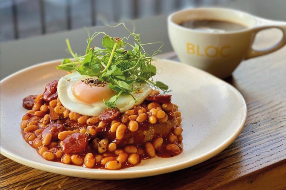 Beans, egg, garnish and a coffee cup from Bloc