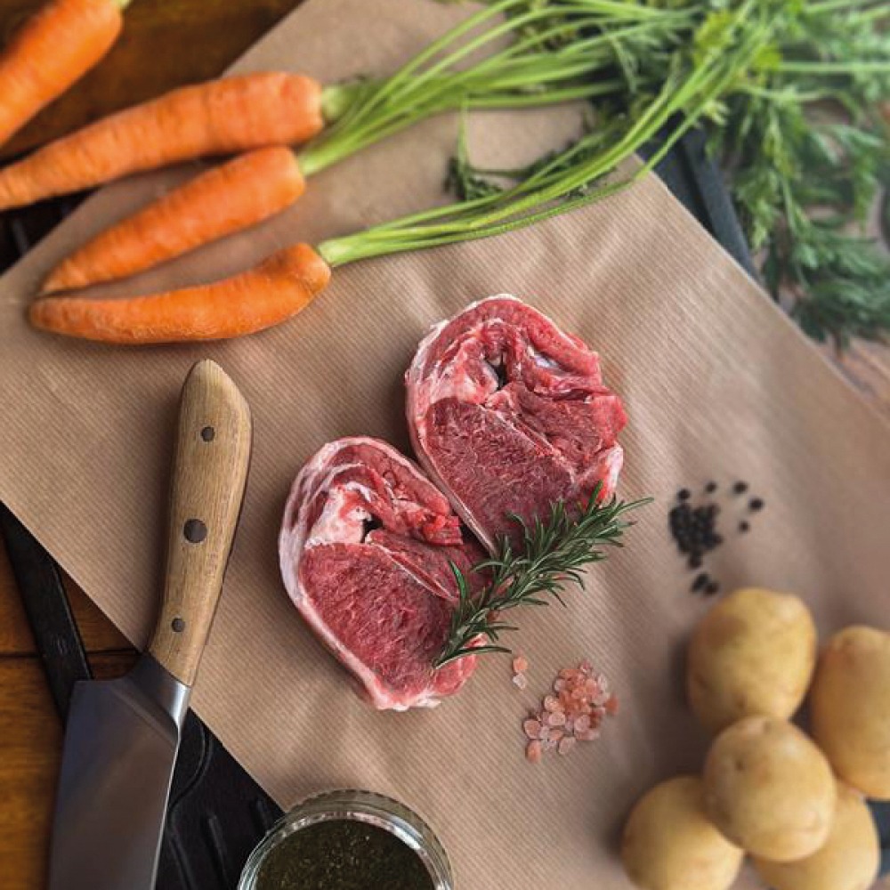 Meat and vegetables on brown paper