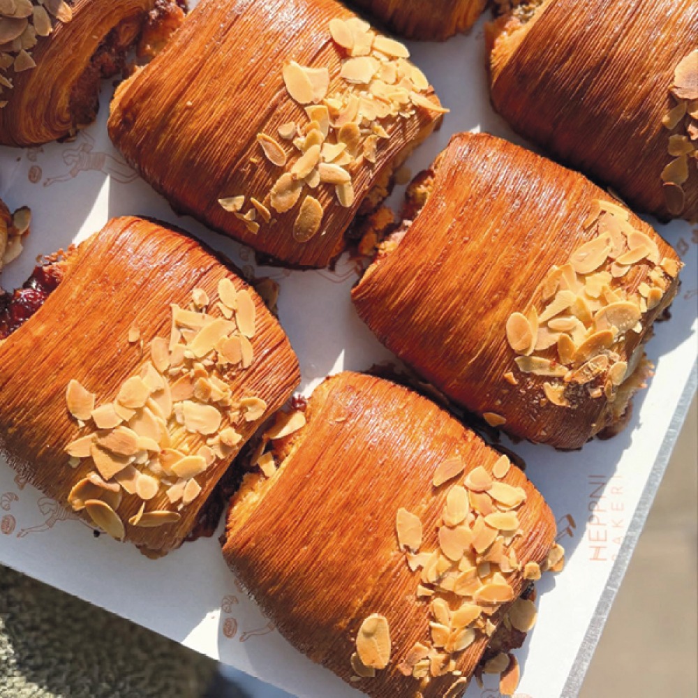 Almond pasties lined on grease paper at Heppni Bakeri