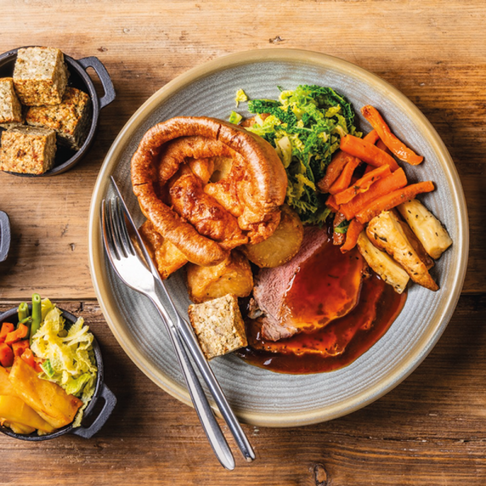 sunday roast with side of vegetables