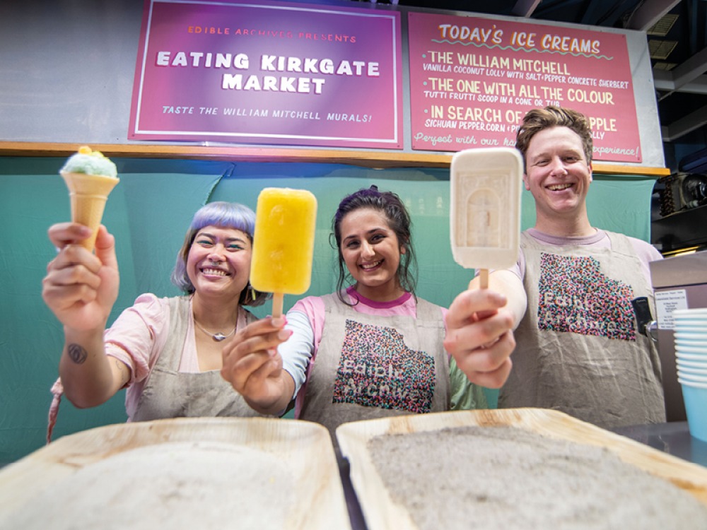 people holding ice creams