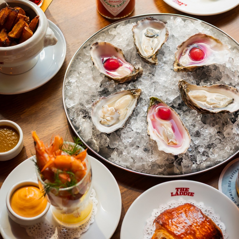 Oysters on ice, Prawn cocktail, cup of chips, pan au chocolate