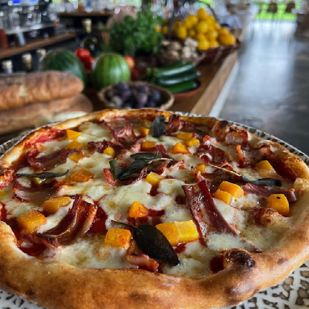Pizza with meat and fruit