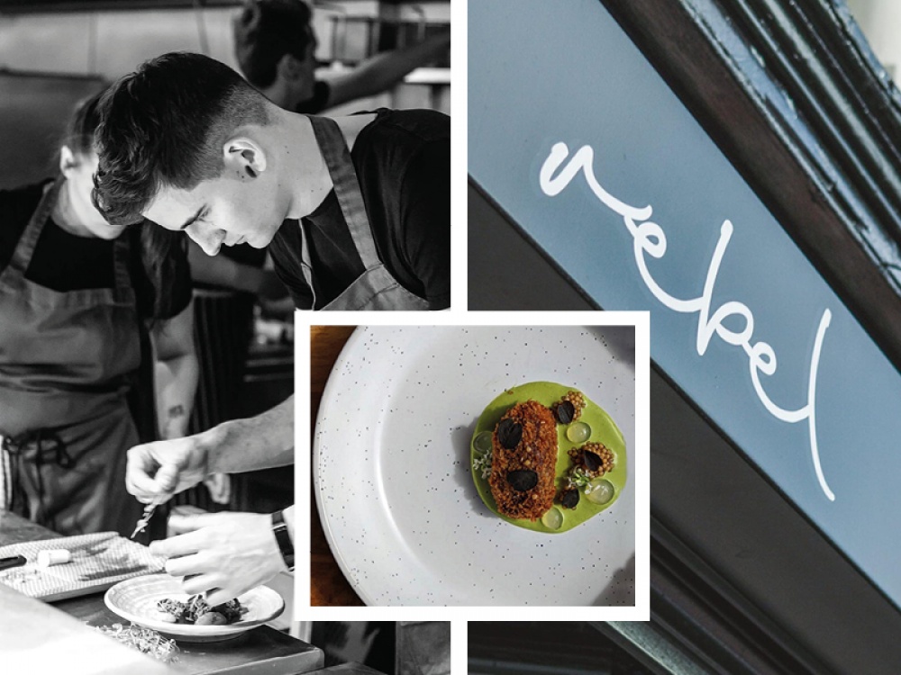 black and white image of a chef plating food