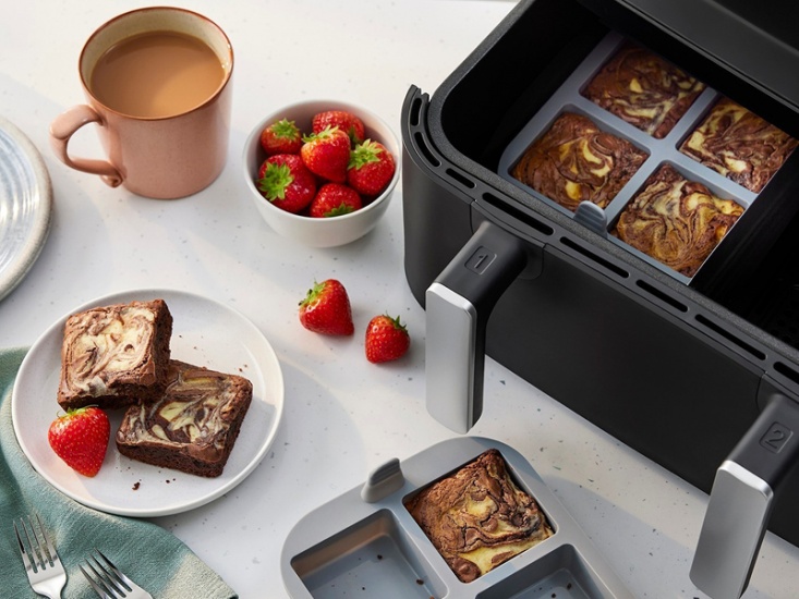 Air Fryer cooking marble slab cakes with strawberries