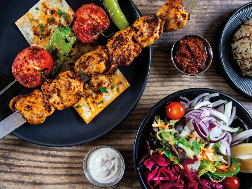 Turkish kebabs with salad and dips