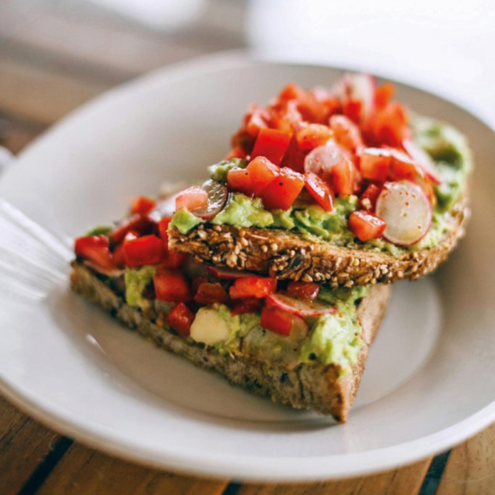 Avocado and tomato on seeded toast