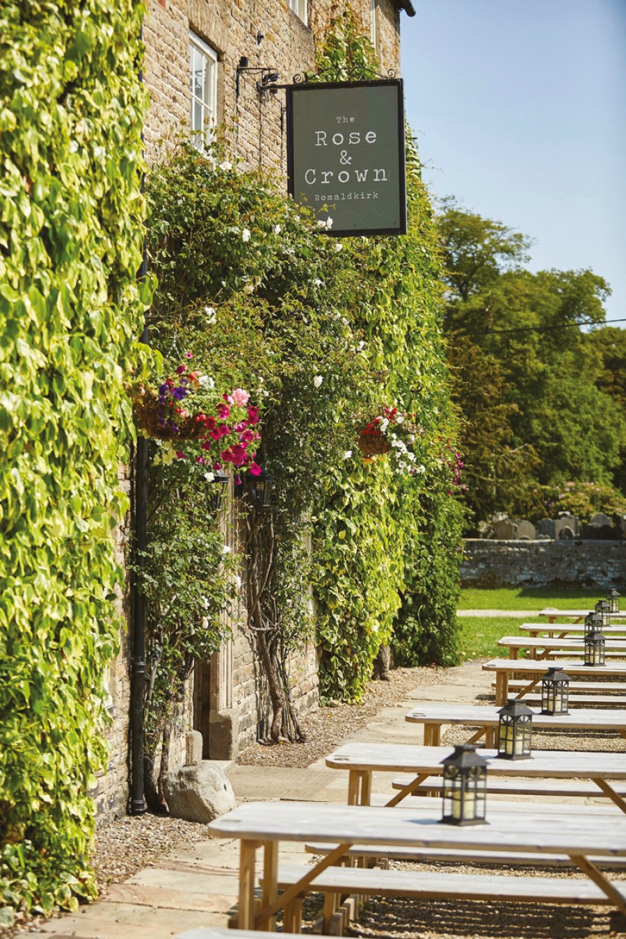 Rose & Crown Pub with green and floral foliage
