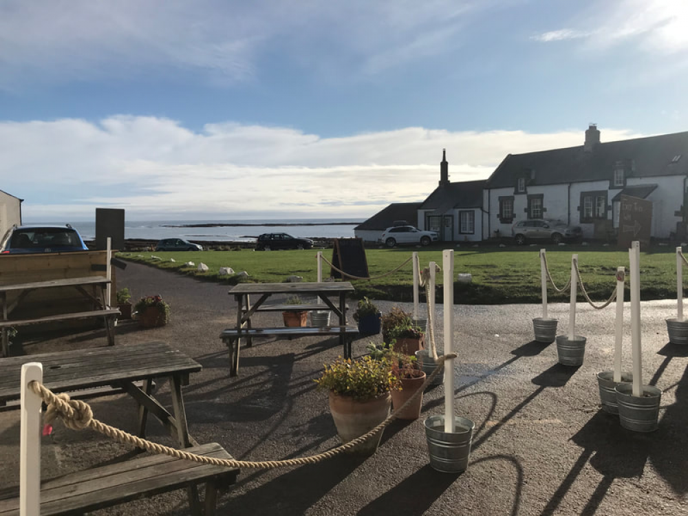 The Ship Inn pub garden with views of the sea