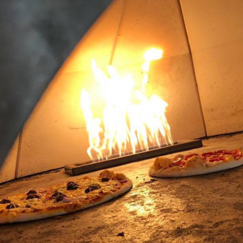 pizza in pizza oven