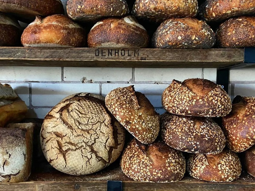 Bread on shelves at PureKnead Bakery