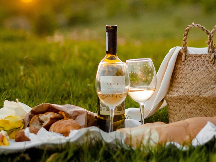 picnic with basket and wine