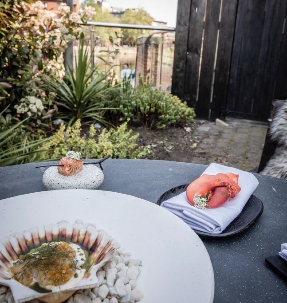 table outdoors with seafood dishes