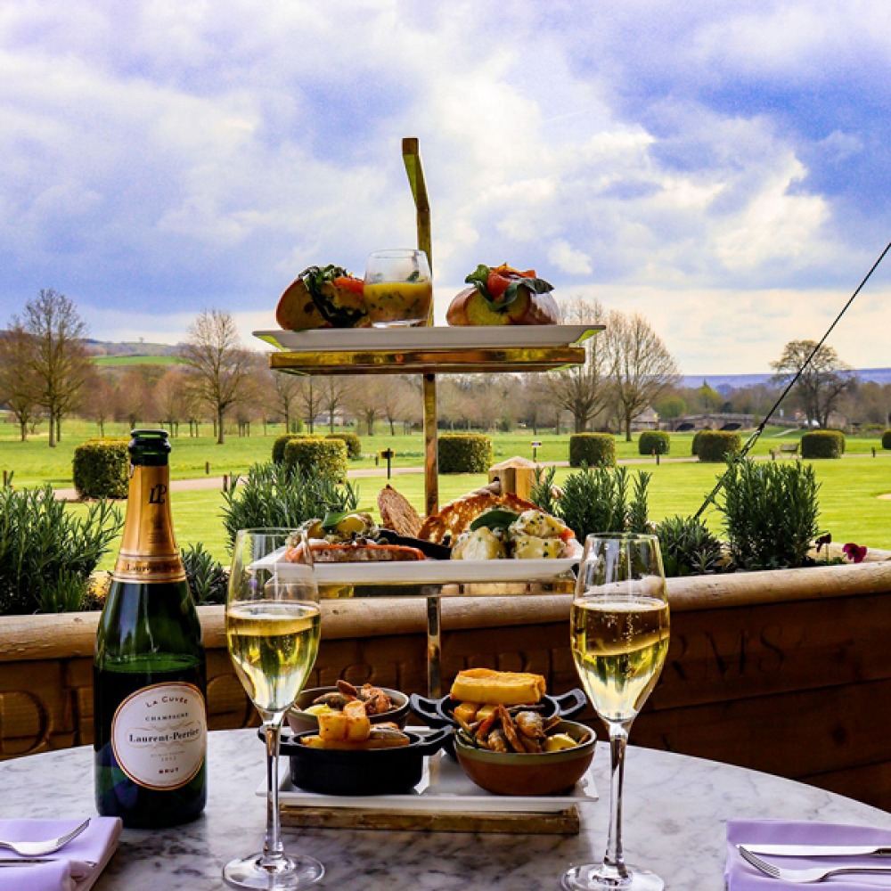 afternoon tea with champagne over looking fields