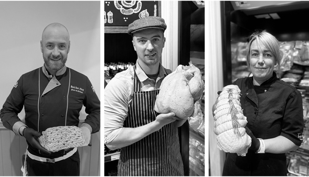 butchers holding meat