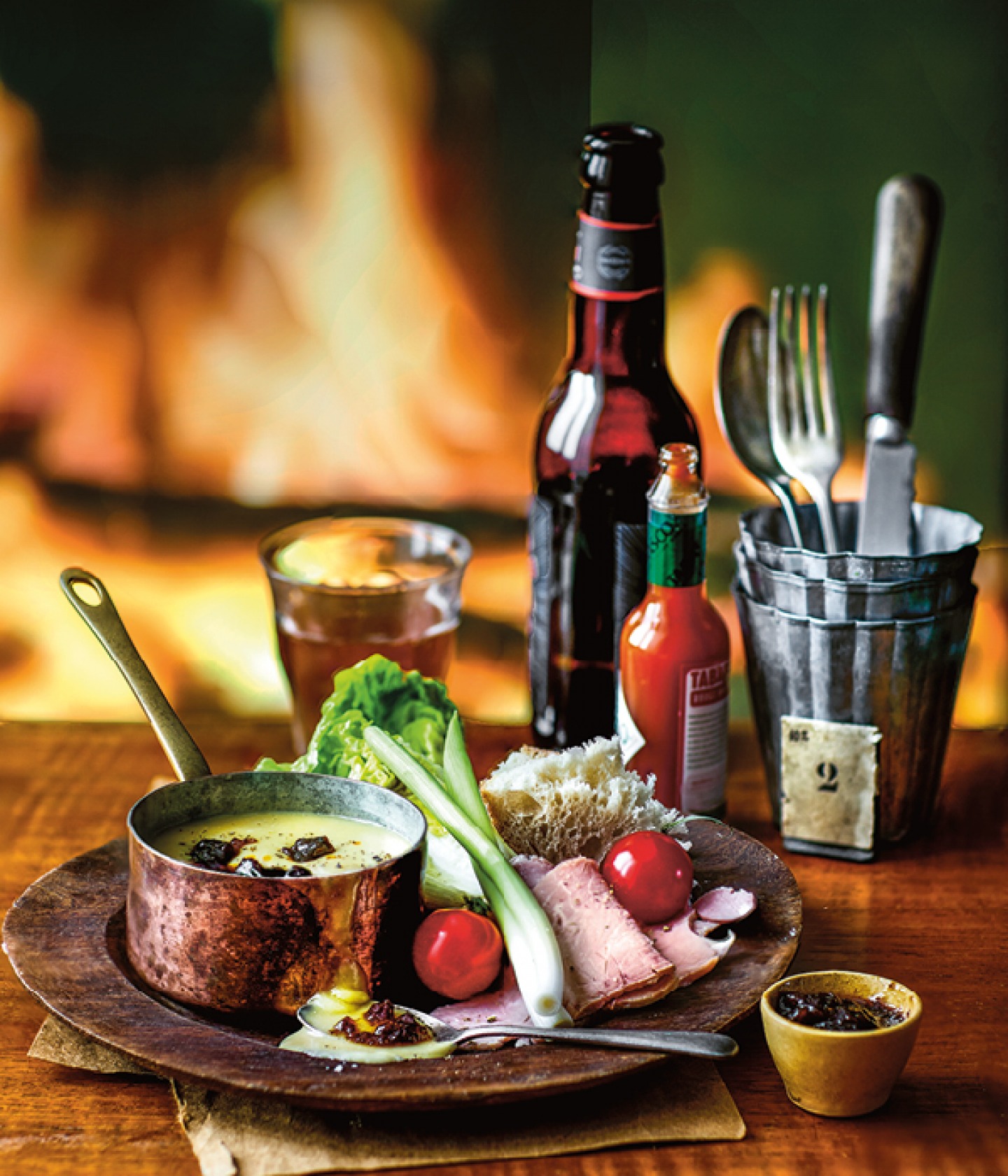 plate of ploughman's lunch, ham, cheese, tomatoes and chutney