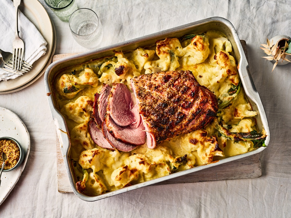 Wholegrain Mustard Easter Ham with Cauliflower Cheese in a silver roasting pan