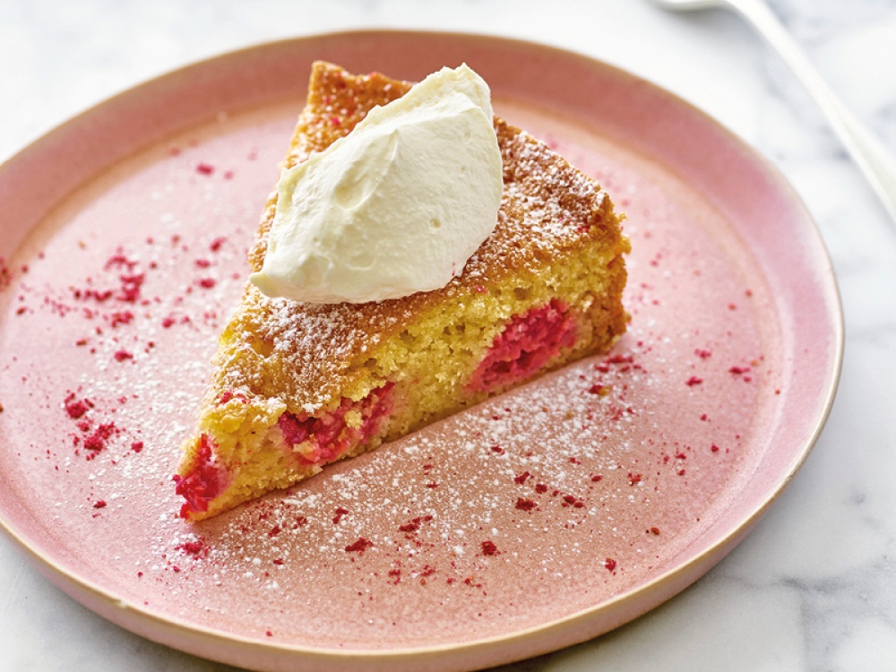 Raspberry and White Chocolate Cake Recipe on a pink plate