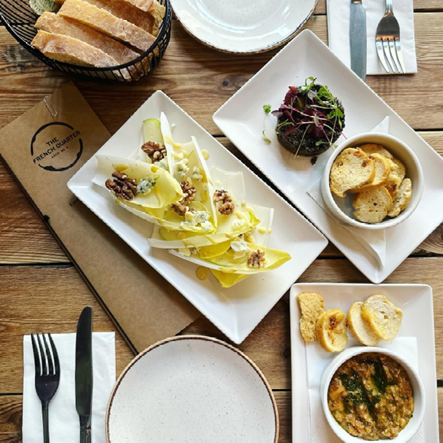 Small plates of French food at The French Quarter