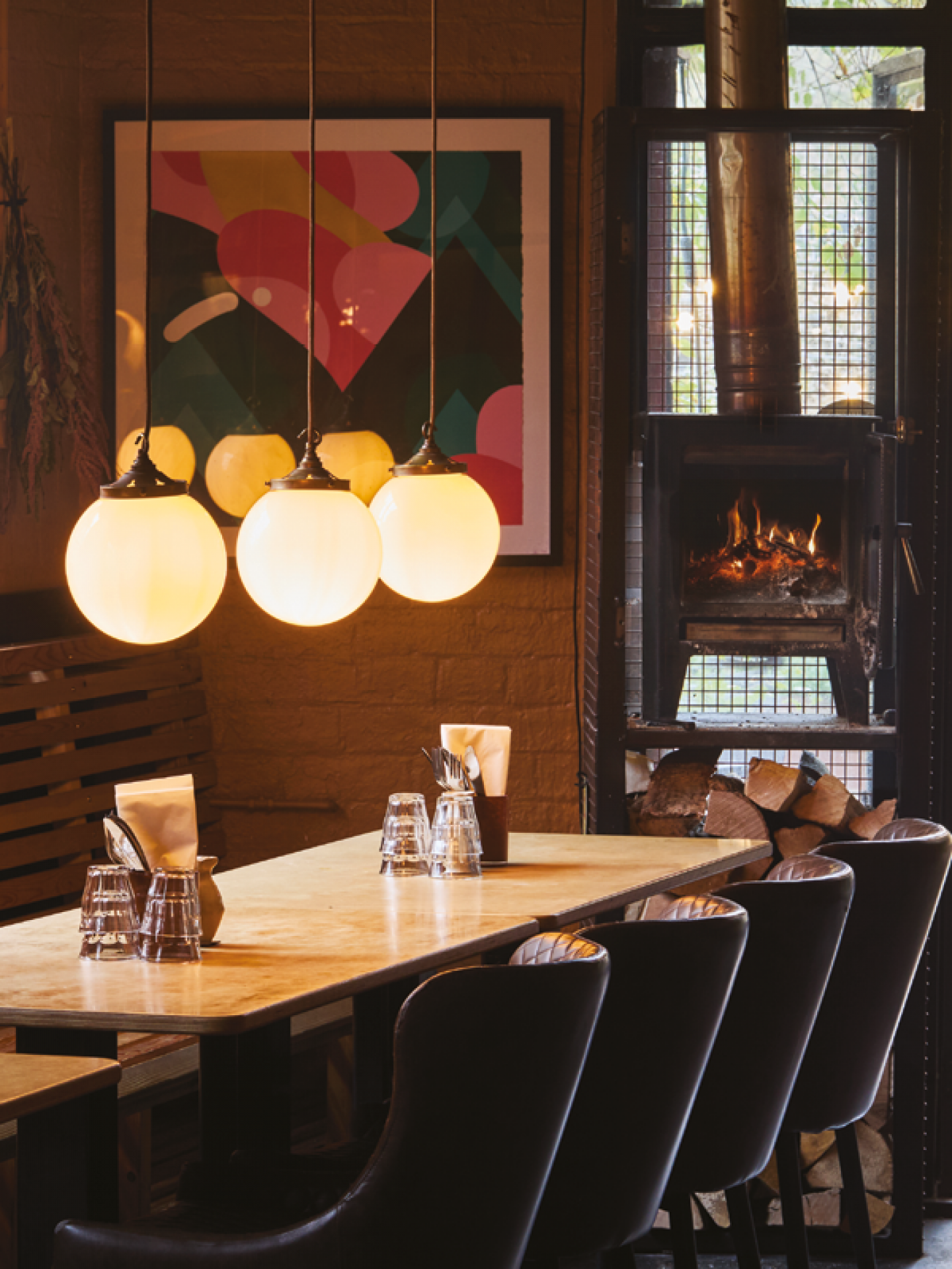 Industrial, low lights decor at Kiln, Ouseburn with log burnrer