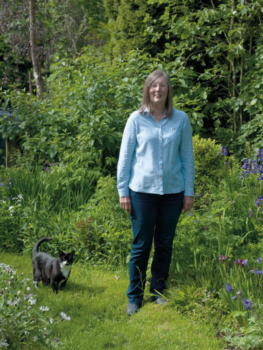 Roz in her garden with her cat
