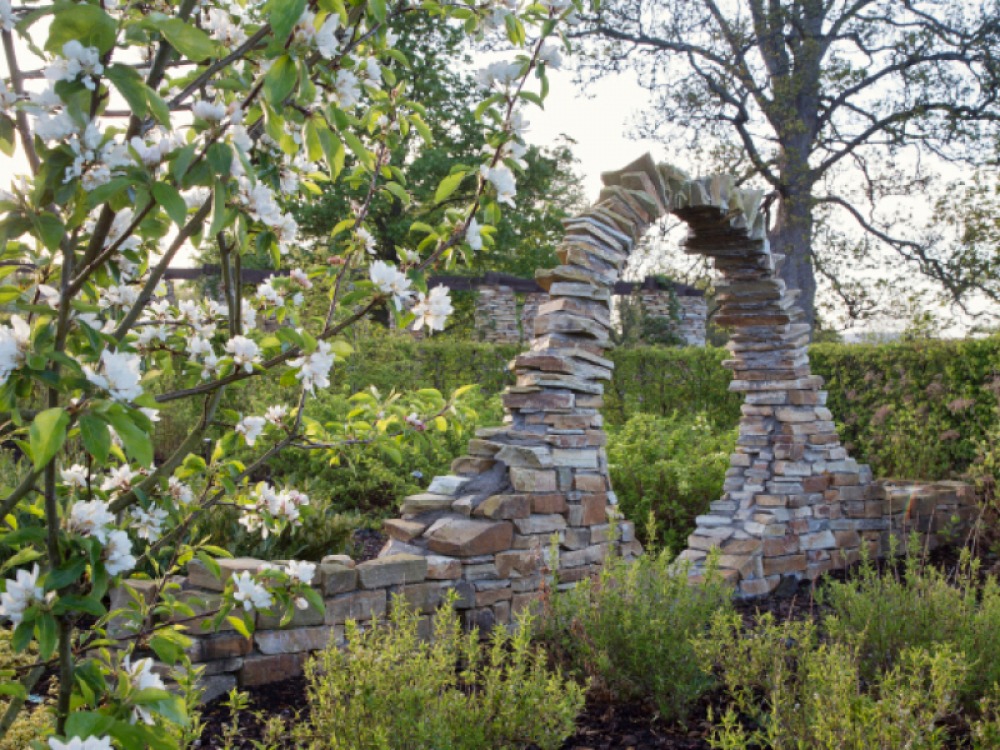 Dry stone sculpture surrounded by greenery at Monteviot House & Gardens