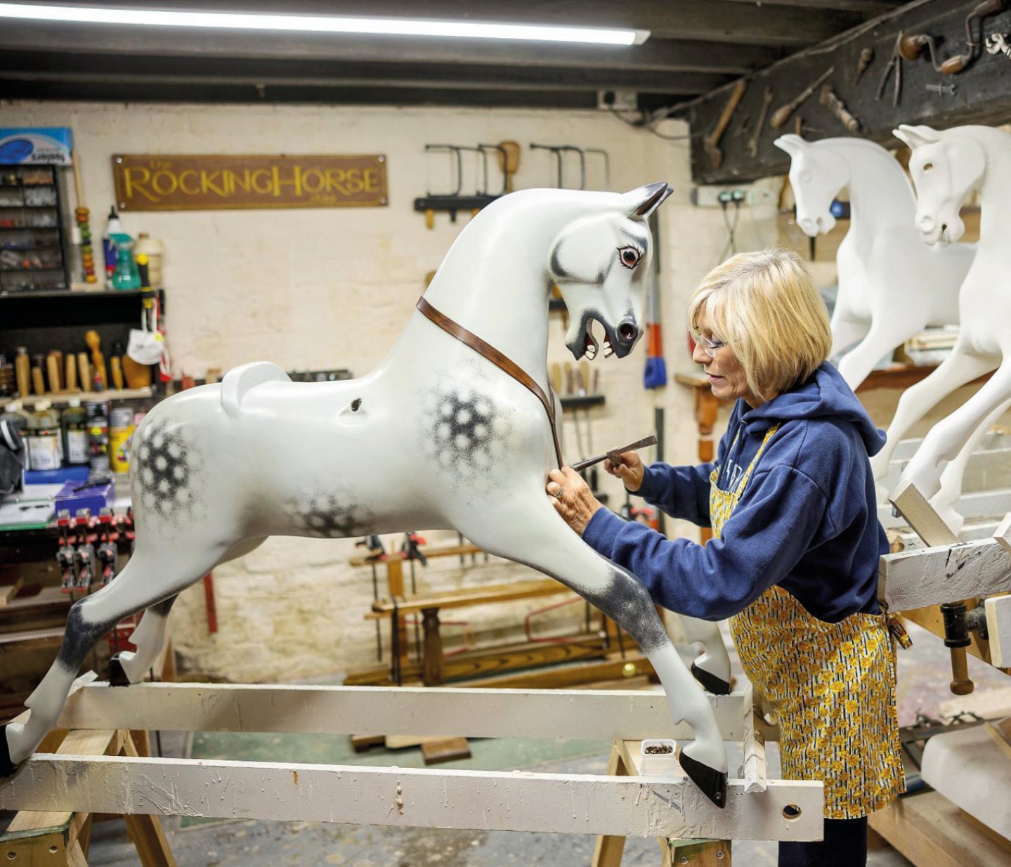 woman making a rocking horse