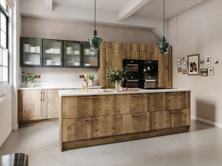 modern kitchen with high ceiling and 2 green pendant lights