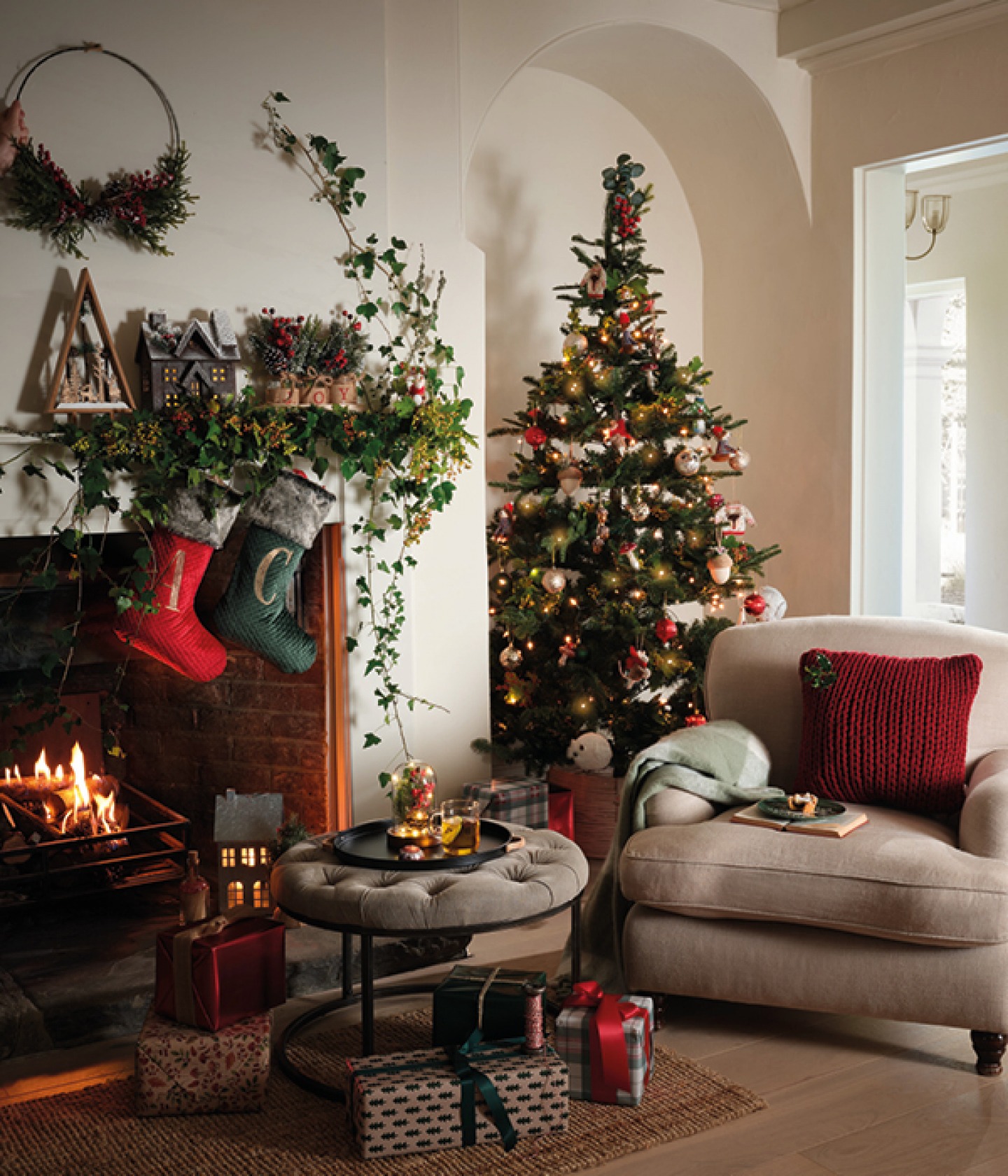 Living area with Traditional Christmas Decor and log burner