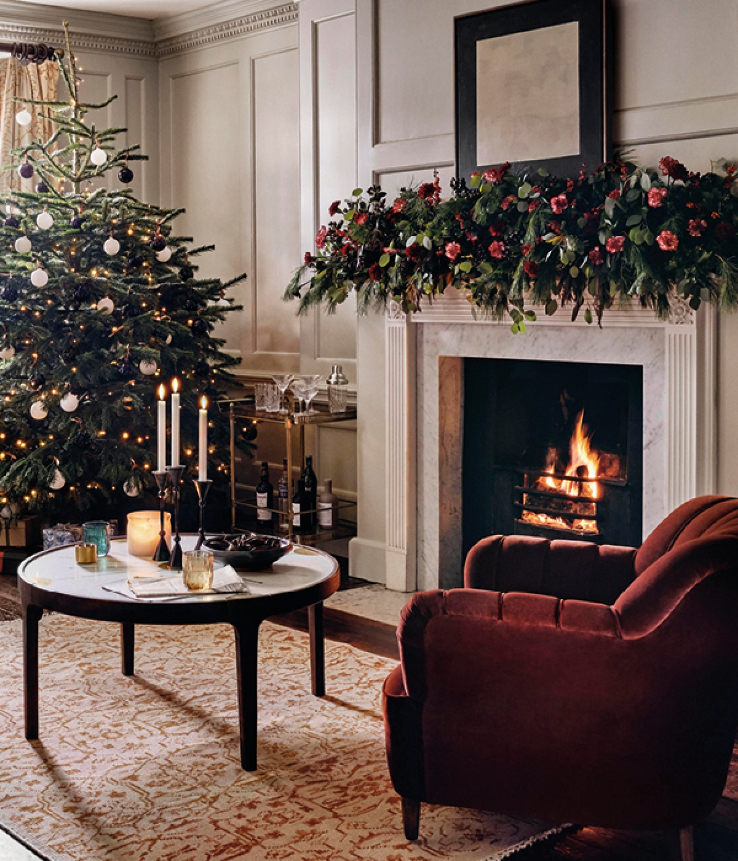 Traditional Christmas room set with Tree, garland and candles