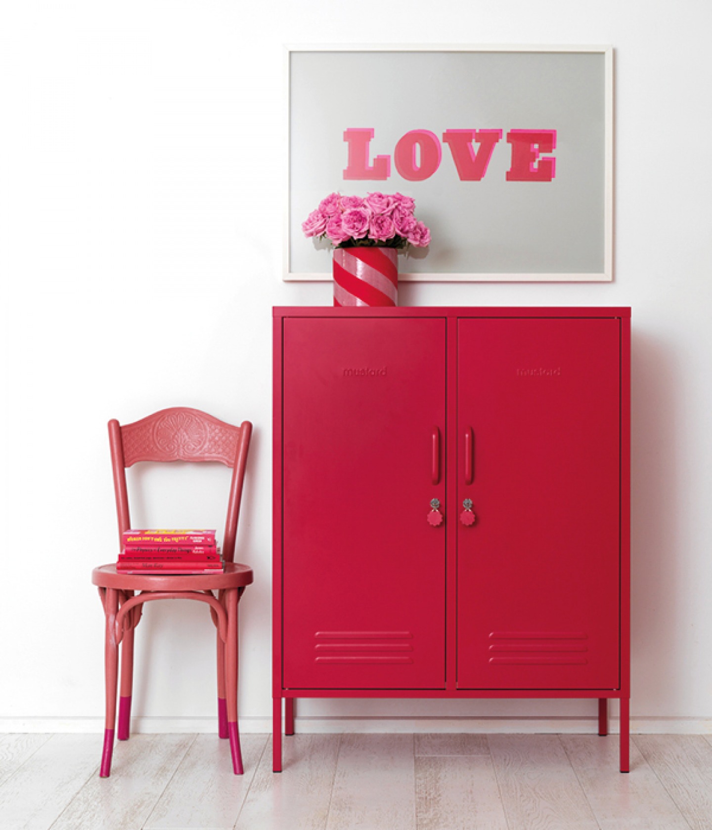 Magenta chair and cabinet with flowers and LOVE print