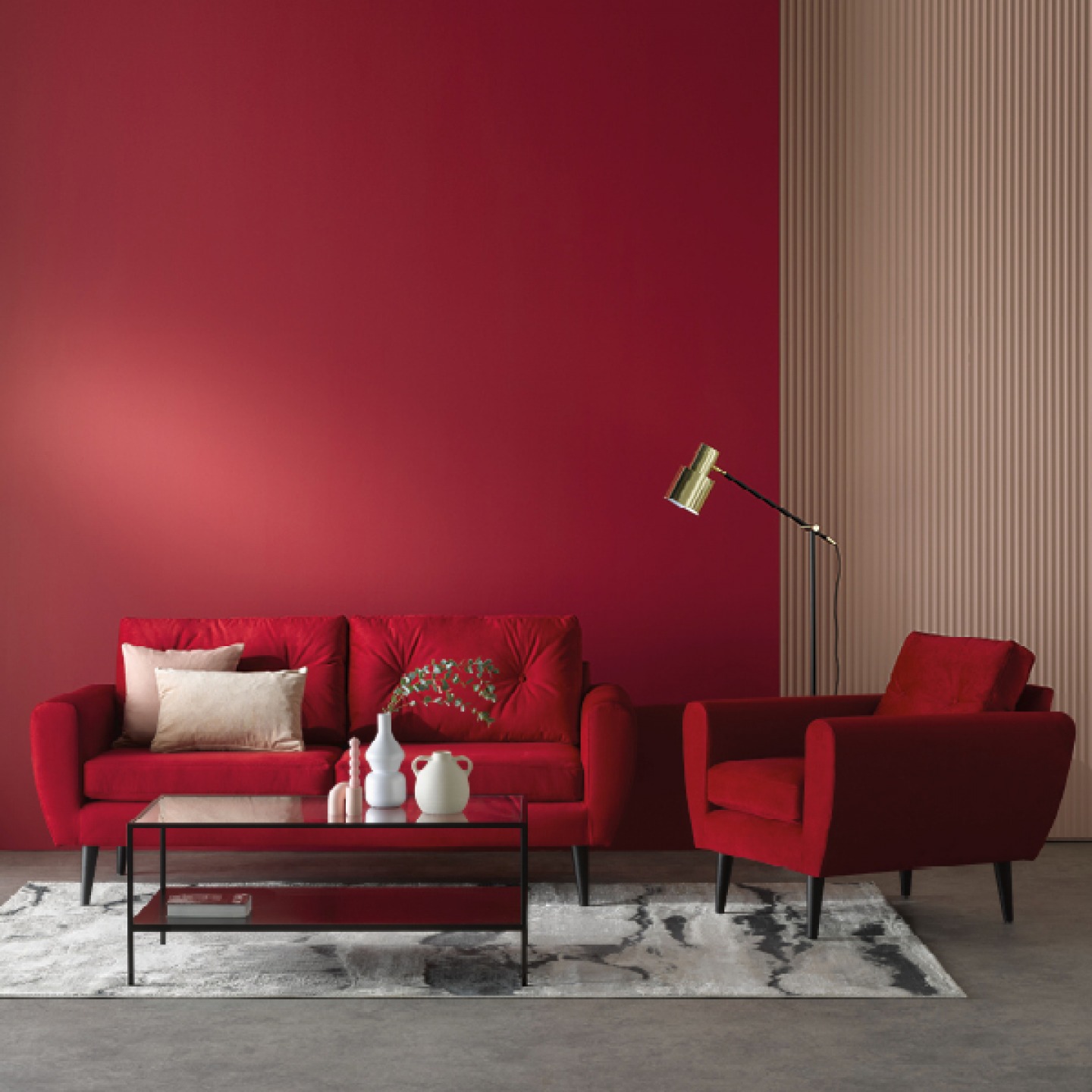 Magenta painted wall with red sofa