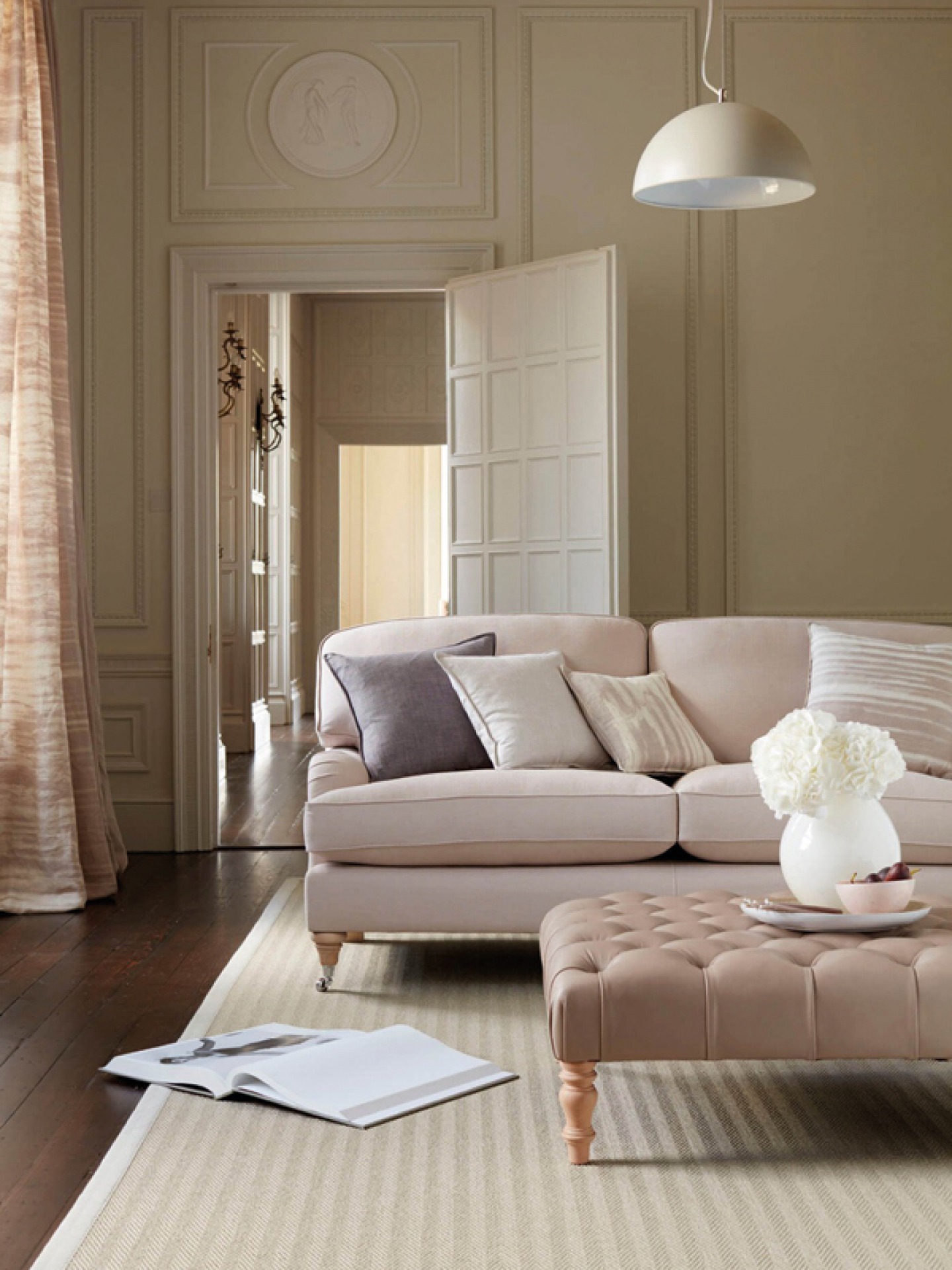 Chelsea loose back sofa in a muted lounge