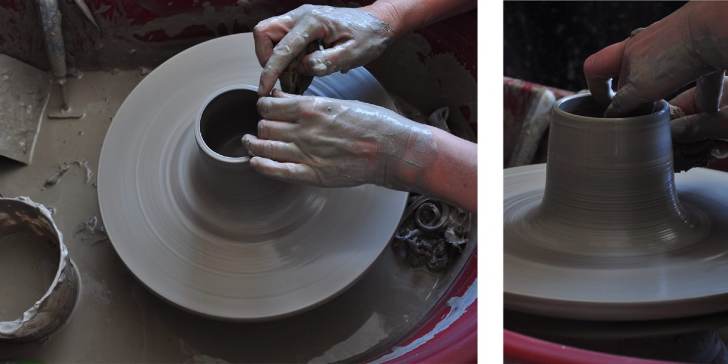 clay being moulded on a potters wheel