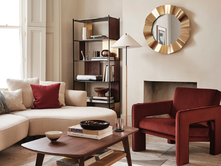 Interior promotion image of cream and burgundy furniture