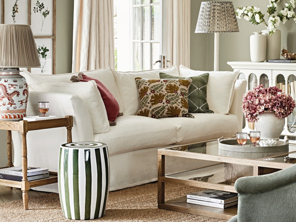 Lounge with muted tones of green and cream