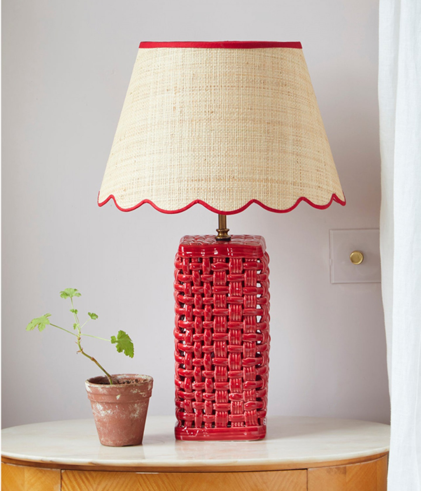 Raffia scallop lampshade with red trim