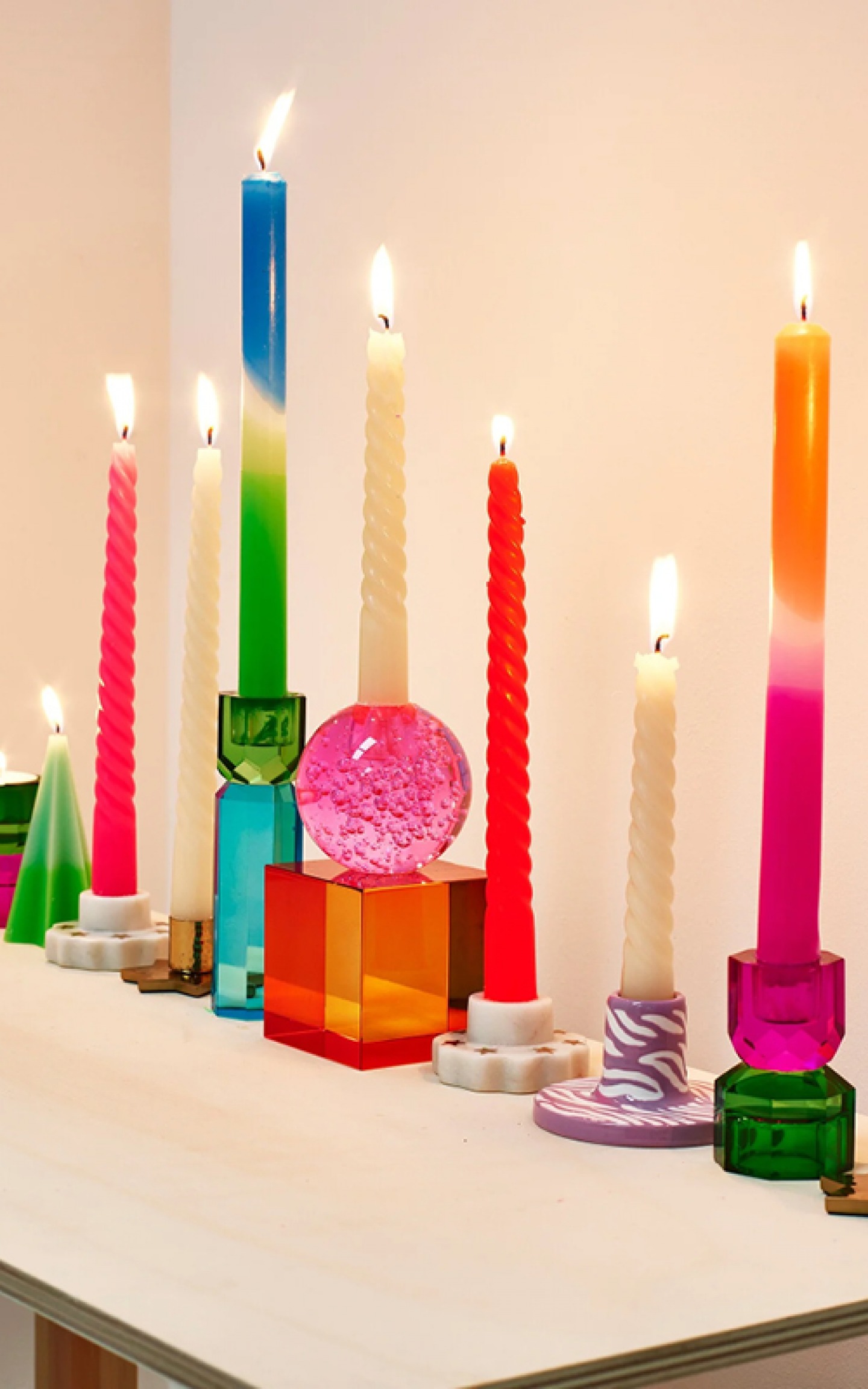 Colourful candle sticks alight