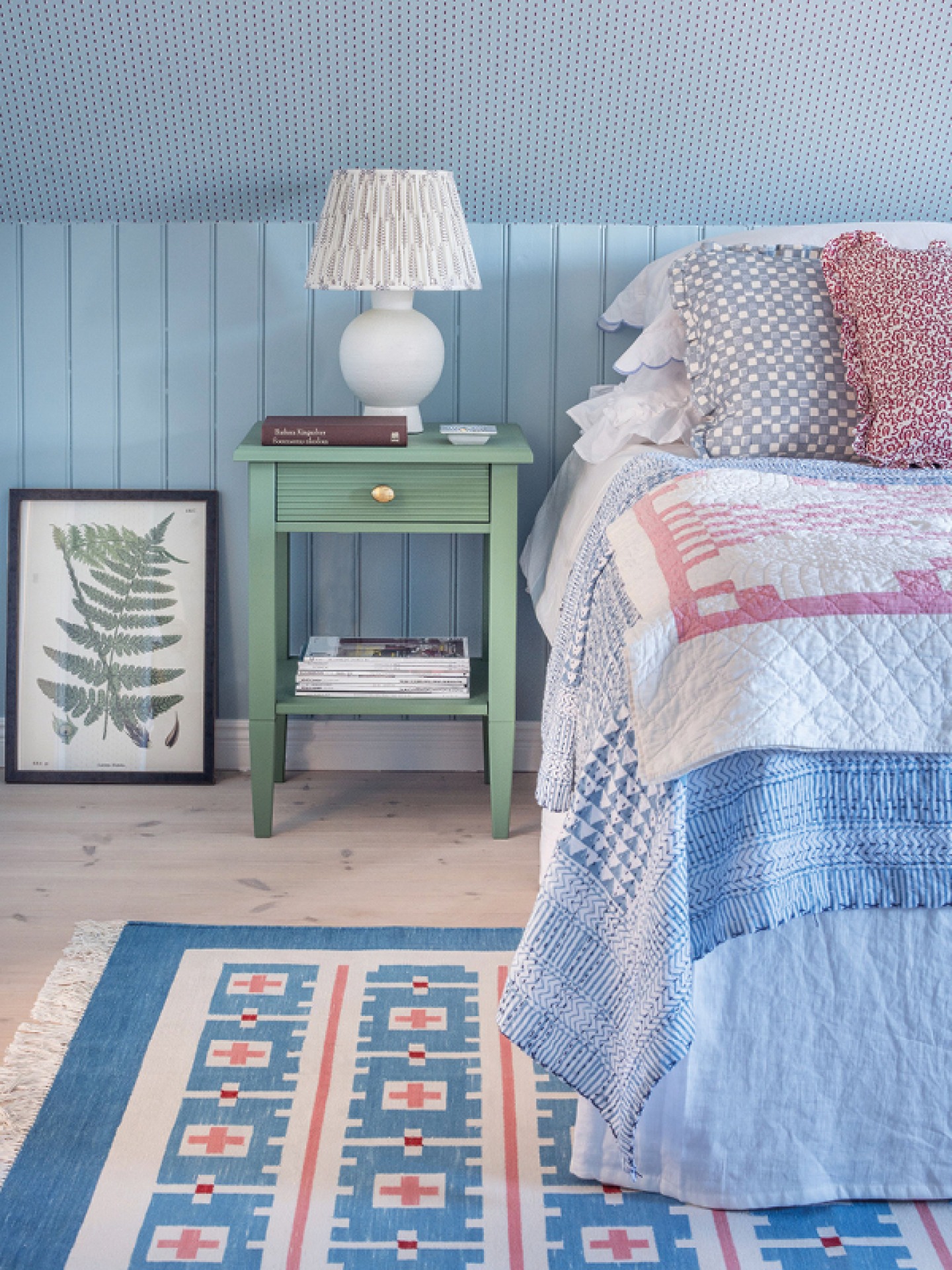 Coastal themed bedroom with red, white and blue colours
